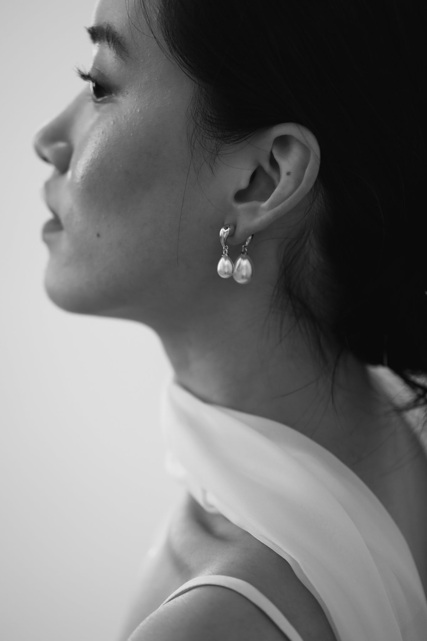 Gilded Asymmetric Pearl Drop Earrings