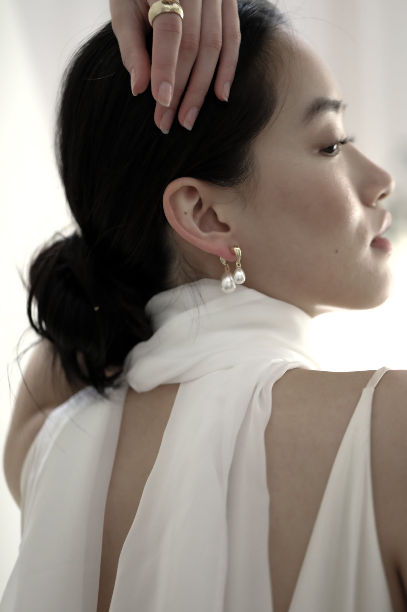 Gilded Asymmetric Pearl Drop Earrings