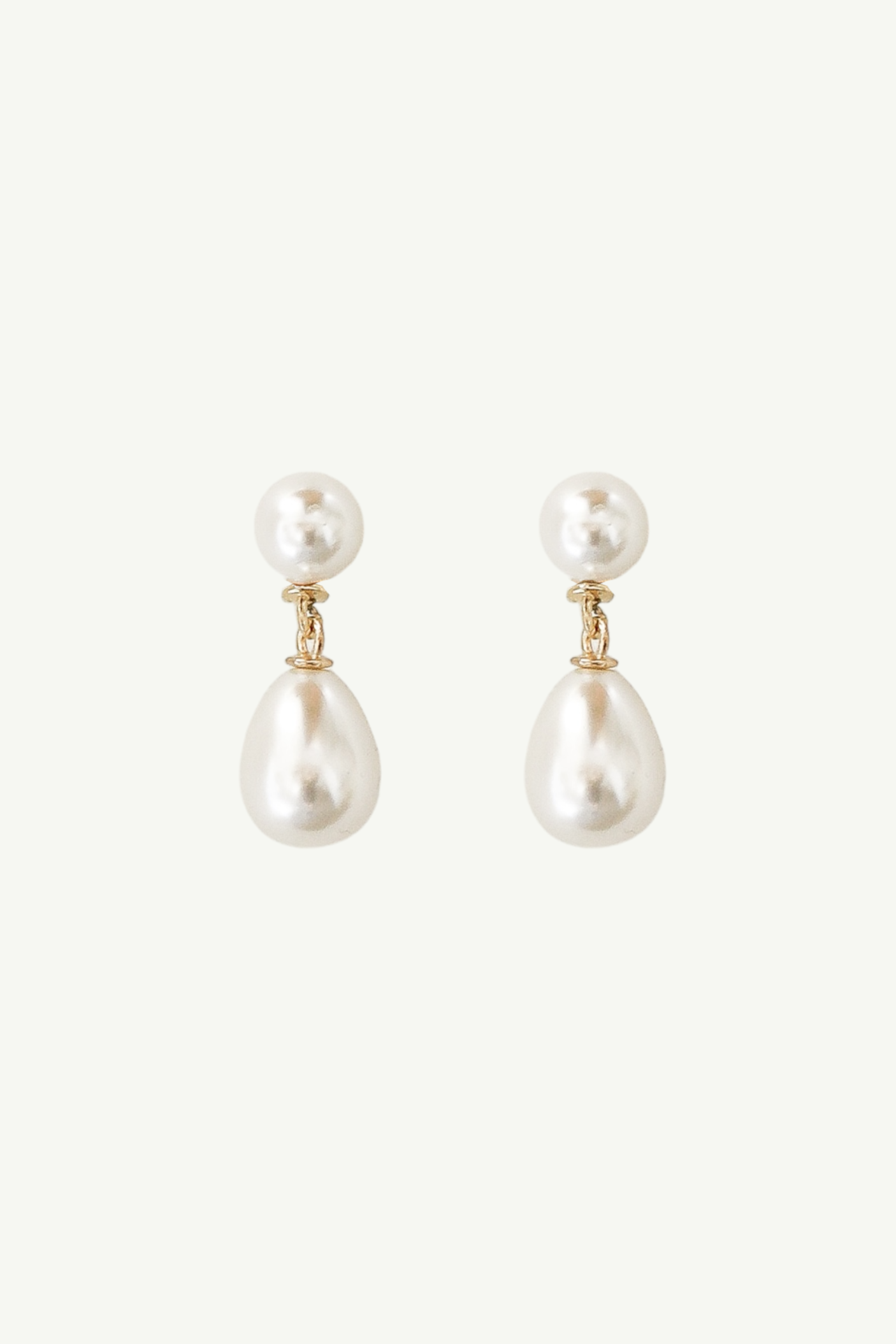 Flat image of Pearl double drop earrings with gold detail