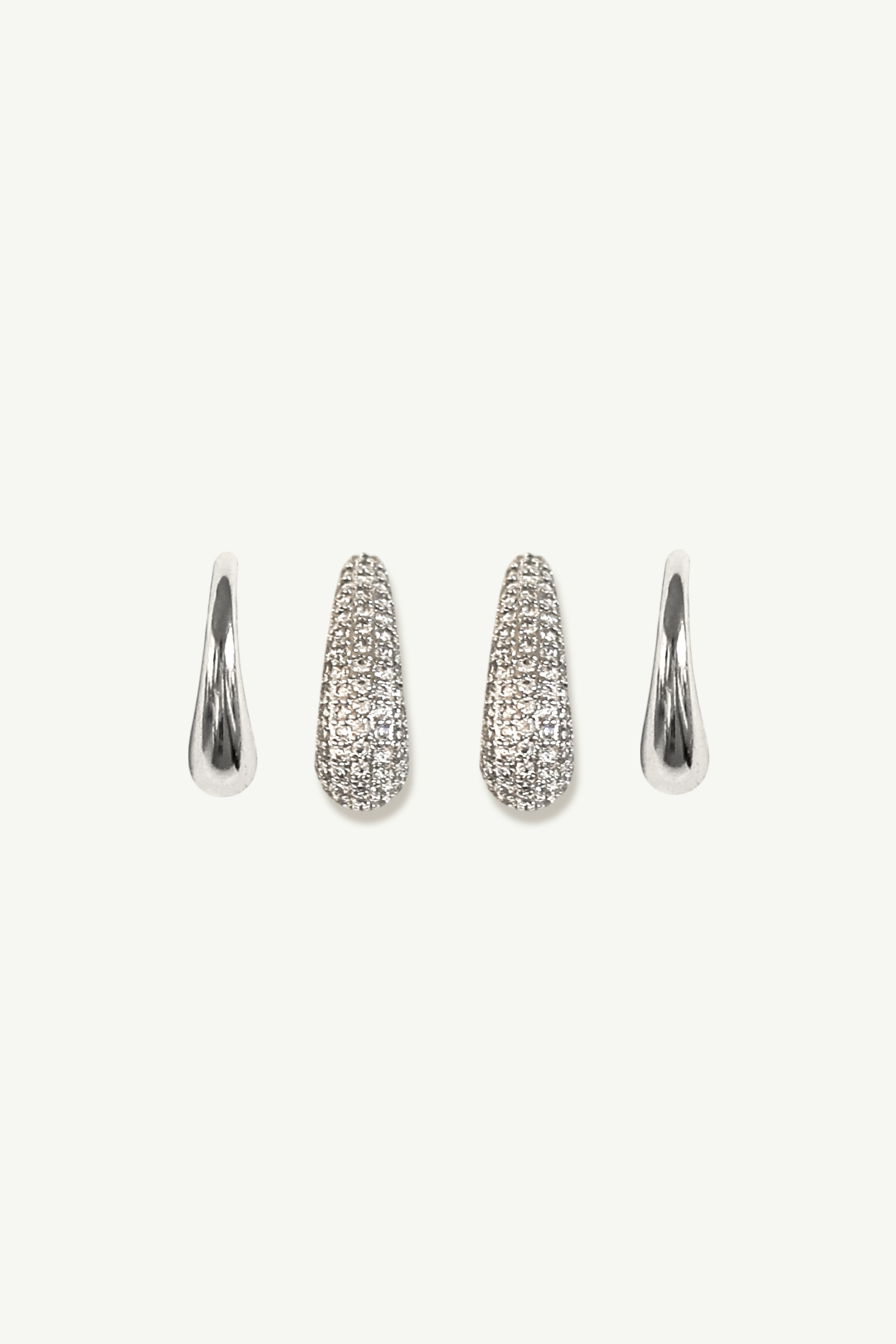 Set of silver pave earrings by Studio Bride on a white background